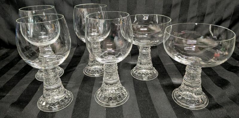 Appears to be 6 Rosenthal Style Baccus Drinking Glasses. 4 Medium Wine Glasses (6" Tall) and Two Champaign Glasses 4.5" Tall.