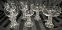 Appears to be 6 Rosenthal Style Baccus Drinking Glasses. 4 Medium Wine Glasses (6" Tall) and Two Champaign Glasses 4.5" Tall.