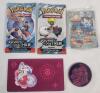 Pok&eacute;mon TCG Collector Lot . Two (2) Sealed Wax Packs , One (1) Sealed Card , Stickers & Game Disc