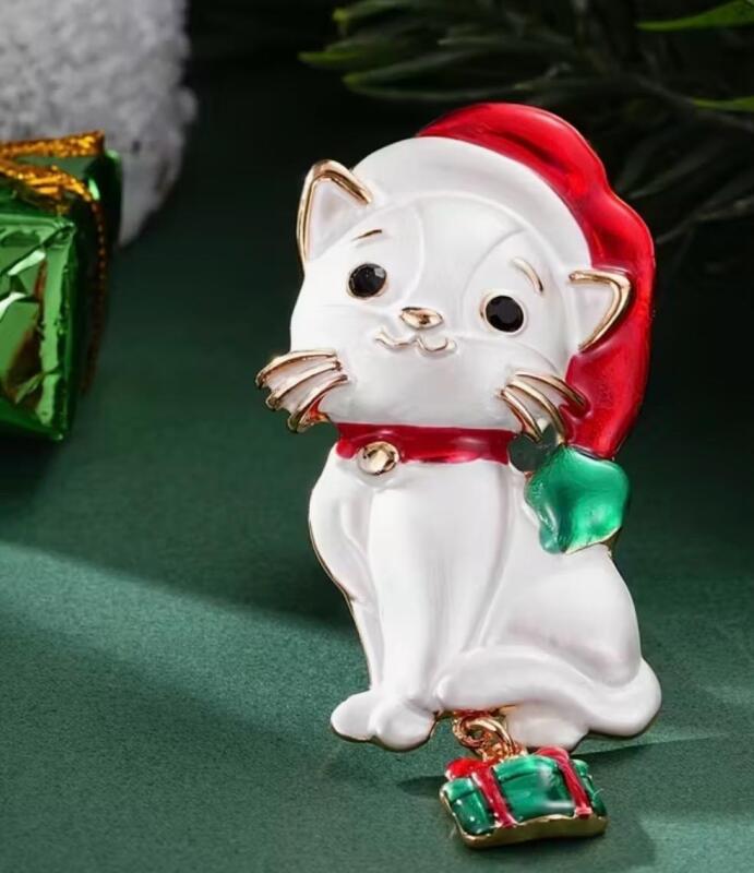 CRING COCO Elegant White Cat Brooch with Red Santa Hat & Golden-Toned Alloy Dangle Boxed Charm Gift Approximately 2.25 x 1.4&rsquo;&rsquo; Adorable Gentle Black Rhinestone Eyes stock photo added