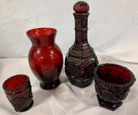 4 Vintage Ruby Glass Pieces. Tallest Piece and Larger Cup Signed Avon. Tallest Measures 8.5" Tall.