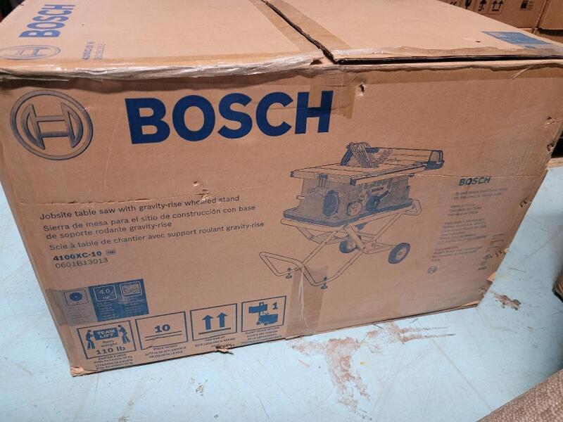 New - Bosch 10" Worksite Table Saw with Gravty-Rise Wheeled Stand . Retail $780 . Model # 4100XC-10