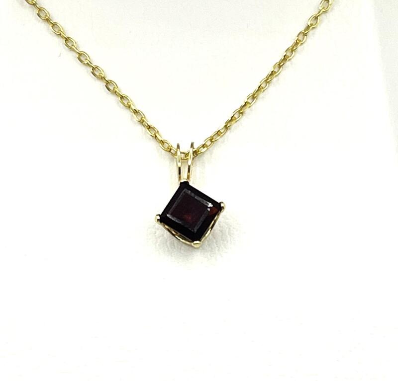 14KT Yellow Gold Natural Garnet Pendant with Gold Plated Sterling Silver Chain, Retail $300.00. Garnet is the birthstone for January.