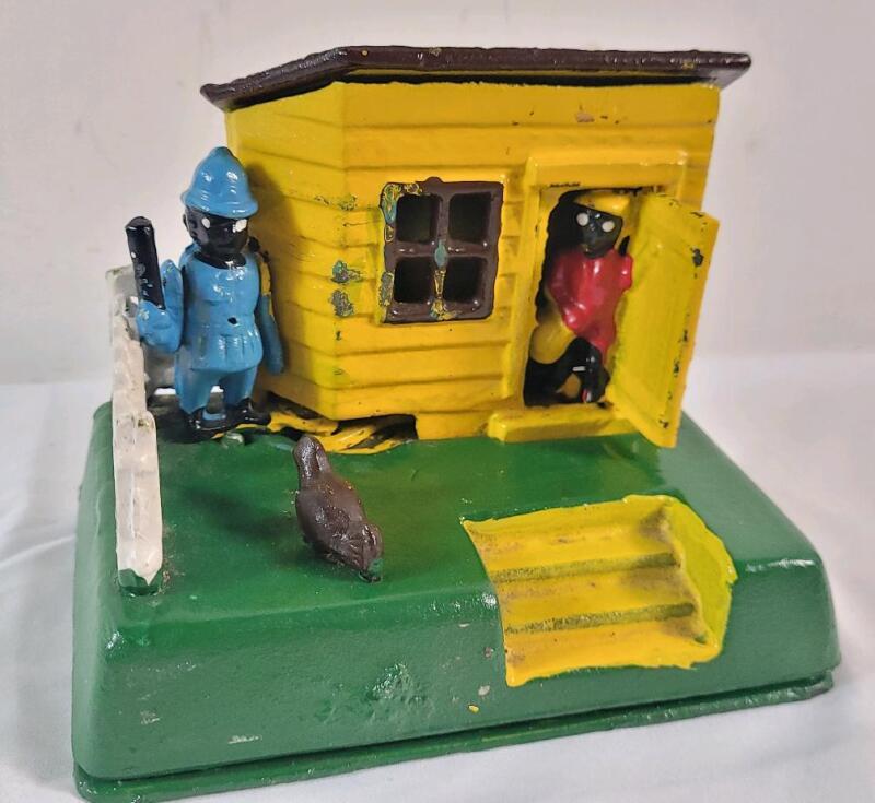Vintage Cast Iron Uncle Remus 136 Mechanical Coin Bank . Measures 5.5"&times;3.5"&times;5.5" . Untested