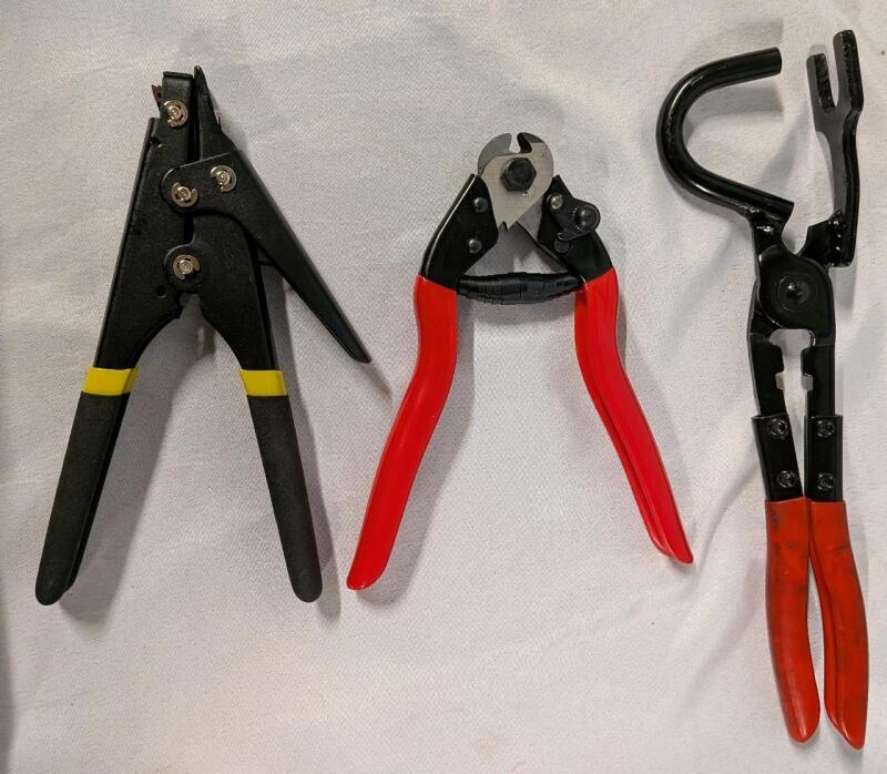 3 New Tools. Wire Cutter, Exhaust Hanger Removal Pliers and Cable Tie Gun. Longest Measures 11"