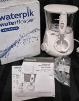 As New in Open Box Waterpik Waterflosser 600 Series Aquarius with 7 Tips