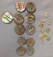 21 Shell Buttons. Larger buttons appear to be Abalone (7 Pink 4 Regular.) largest Button Measures 1.125" Across.