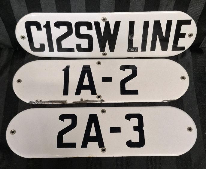 Three (3) Vintage Enamel Industrial Signs . Possibly Railway Signs . Each measures 14"&times;4"