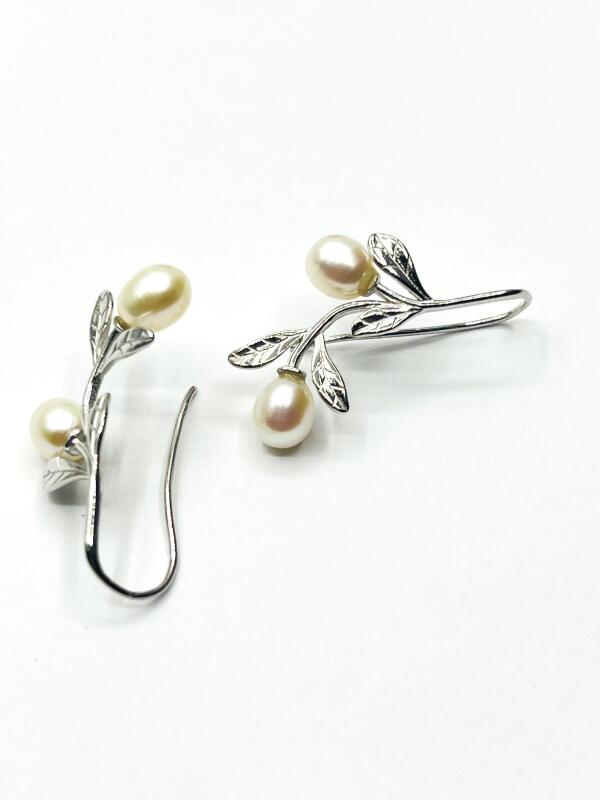 Sterling Silver Freshwater Pearl 7.8-6.1mm Earrings with Ear Wire, comes with APPRAISAL $180.00.