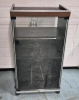 Vintage Stereo Cabinet on Castors. 19.5" by 15.5" by 35". 2 Shelves and place for LP's. Door Magnets still Work.