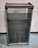 Vintage Stereo Cabinet on Castors. 19.5" by 15.5" by 35". 2 Shelves and place for LP's. Door Magnets still Work.