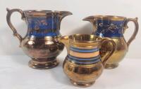 Three (3) Lusterware Water Jugs . Measures 3 &frac14;" , 4 &frac12;" & 4 &frac34;" tall .