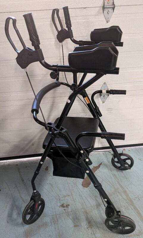 Elenker Upright Walker. Stands 50" Tall. Rolls Smoothly. Brakes Function.
