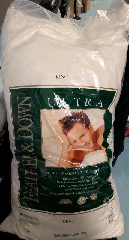 New Feather & Down Ultra King Sized Pillow. 220 Thread count Twill Cover.