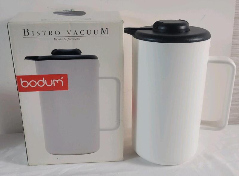 Bodum Bistro Vacuum Liner Thermo Jug w/Thermo Glass Insert , White . Measures 9.5" tall . Model # 1601