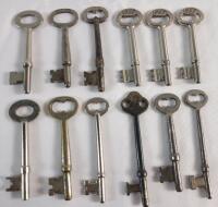 12 Vintage Skeleton Keys . Measures 2 ⅝" to 3 ⅛" long