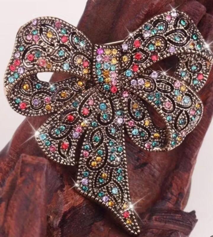 Glamorous Rhinestone-Encrusted Bow Brooch - Perfect for Dresses, Coats Sweaters, Toques and Clutch Bags Beautiful Craftsmanship approximately 3 x 2.5&rsquo;&rsquo; stock photo added, colours may vary slightly