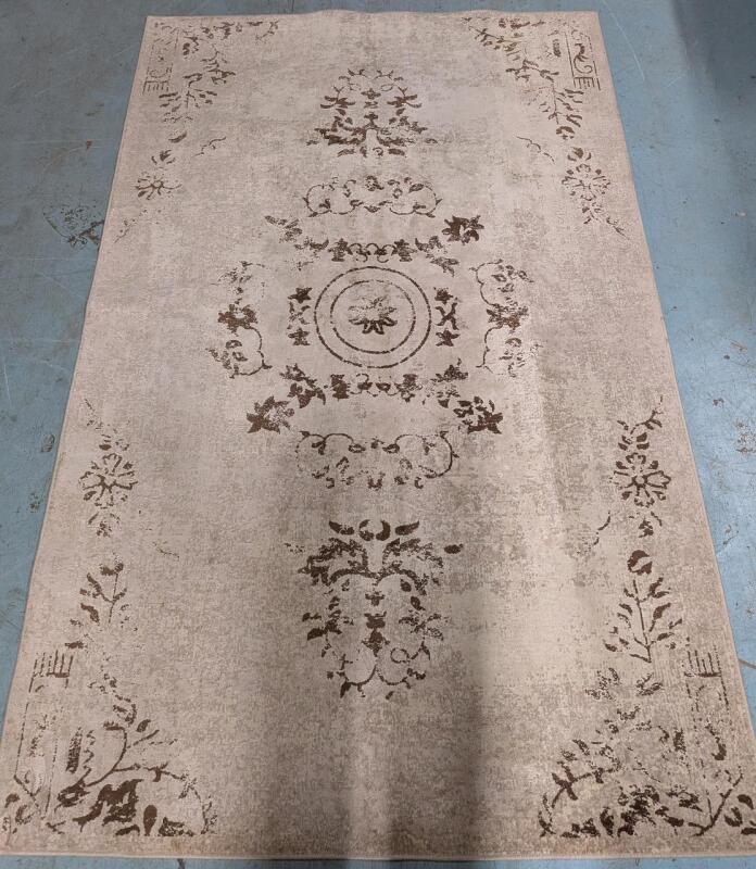 95" by 61" Area Rug.