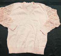 New Size XL Adult Sweater with Mesh Sleeves.