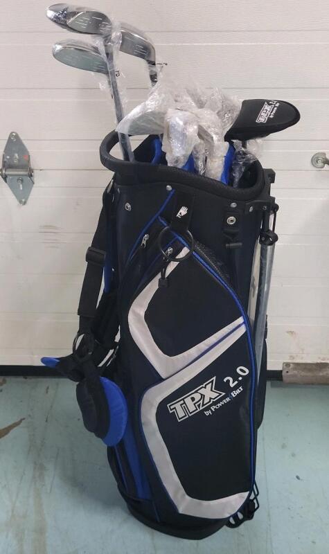 New - Power Bilt TPX 2.0 Men's Left-Handed Golf Club Set w/Standing Bag . Includes : 3 Wood, 3 & 4 Hybrid, 6, 7, 8, 9, Pitching Wedge & Sand Wedge Irons, Putter, Three Headcovers and a Standing Bag . Retail New $280