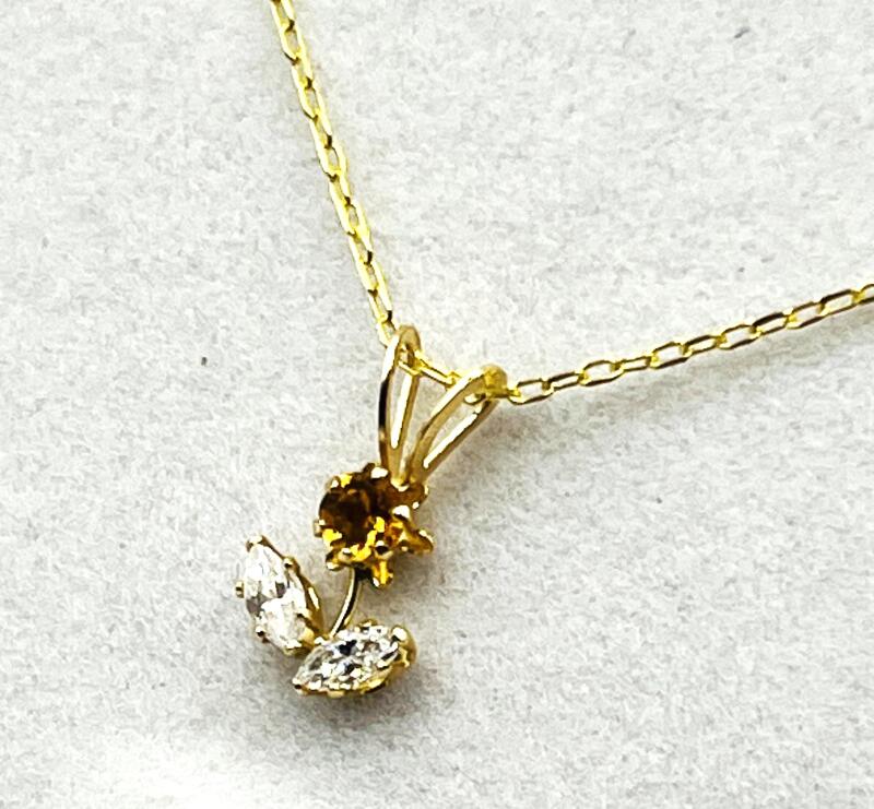 10KT Yellow Gold Natural Citrine and CZ Flower Pendant with Gold Plated Sterling Silver Chain, Retail $300.00. Citrine is the birthstone for November.