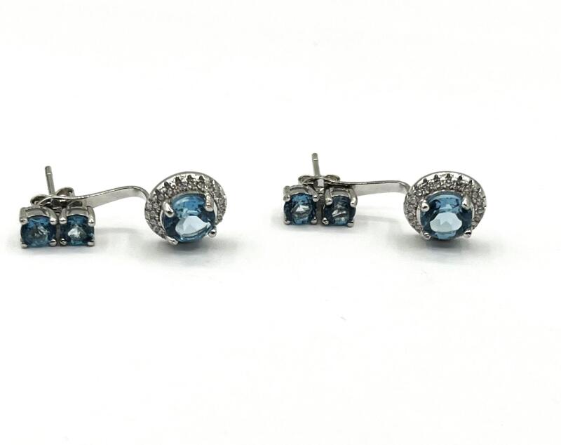 Sterling Silver Natural Blue Topaz (3.15ct) with CZ (0.35ct) Earrings, comes with appraisal $355.00. Blue Topaz is the birthstone for December.