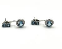 Sterling Silver Natural Blue Topaz (3.15ct) with CZ (0.35ct) Earrings, comes with appraisal $355.00. Blue Topaz is the birthstone for December.