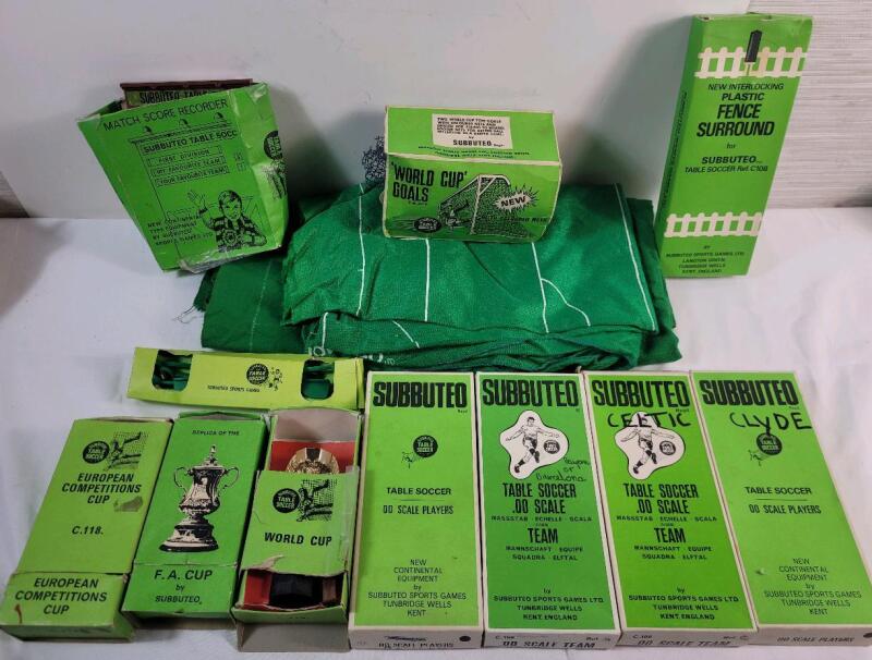 Vintage Subbuteo Table Soccer Football Game And Accessories . Includes : Playing Mat , 4 Teams , Goal Nets , Score Board , Fencing & 3 Trophies . Missing Ball , Some pieces broken