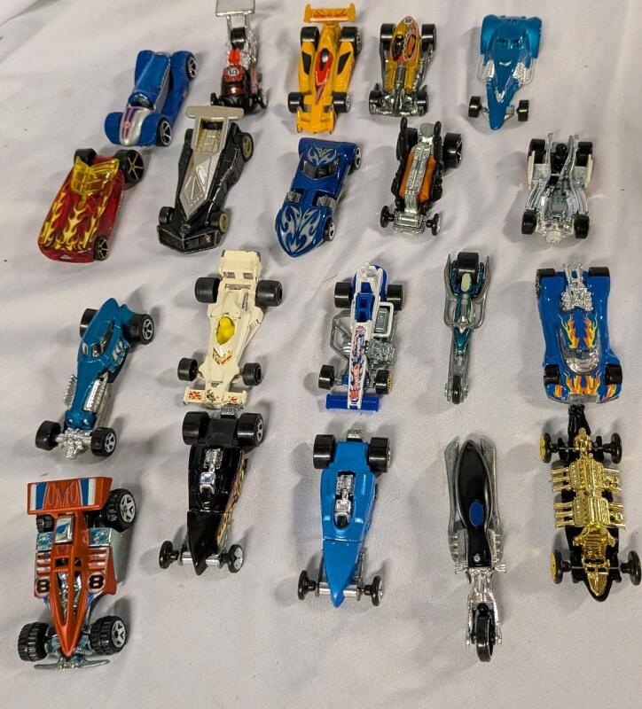 20 Diecast Cars. Hotwheels Motomaster and More. Cars are roughly 2.5" Long