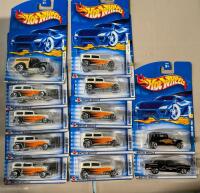 13 Vintage New In Box Hotwheels. Assorted Vehicles. All Fords.