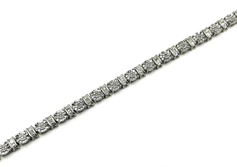 Sterling Silver Natural Diamond (0.25ct) Bracelet, comes with appraisal $935.00. Diamond is the birthstone for April.