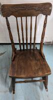 Vintage Press Back Rocking Chair. 31" Tall, 28" Deep and 16" Wide.
