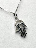 Sterling Silver Natural Diamond (0.11ct) Hamsa Hand with Heart Pendant and Sterling Silver Chain, W/A$500.00. Diamond is the birthstone for April.