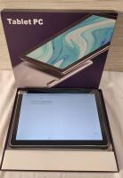 11" Android Tablet PC w/Charger & Case . Tested Powers Up , Set to Default Start-Up Settings .