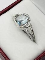 Sterling Silver Natural Blue Topaz (1.75ct) with CZ (0.20ct) Ring, Size 7.5, comes with appraisal $260.00. Blue Topaz is the birthstone for November.