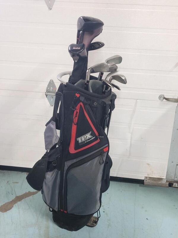 Power Bilt TPX Men's Right-Handed Golf Club Set w/Standing Bag . Includes : Driver , 3 Wood, 3 & 4 Hybrid, 5, 7, 8, 9, Pitching Wedge & Sand Wedge Irons, Putter, and a Standing Bag .
