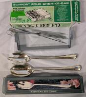 As New Untensil Lot. Shiskebob Holder and Silver plated Serving Utensils. Utensils measure 13" long