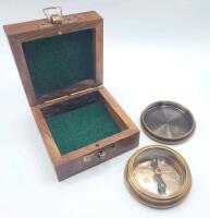 New Brass Compass w/Screw on Lid in Wooden Box . Measures 2 ⅜" diameter.