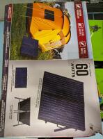 As New Coleman Solar Panel, Crystalline Briefcase Style, 60W approximately 14" by 25". Retails $460