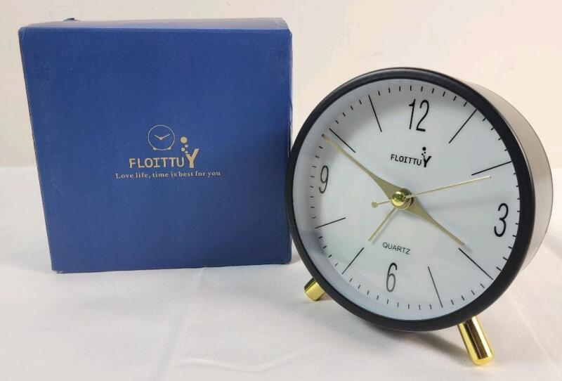 New - Floittuy Quartz Alarm Clock . Requires 2 AA Batteries (not included)