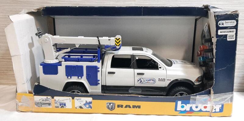 As New Bruder 1:16 Scale RAM 2500 Service Truck w/ Included Lights | Measures 14&frac12;" Long, 6" Tall