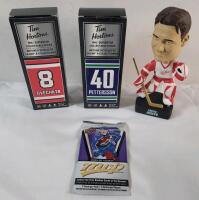 NHL Hockey Memorabilia Lot . 2025-26 UD MVP Sealed Trading Card Wax Pack , 2 Tim Hortons NHL Superstars Mini Sticks (Ovechkin & Pettersson ) & Curtis Joseph Bobblehead .