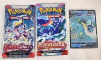 Two (2) New Pok&eacute;mon TCG Scarlet & Violet Sealed Packs and Pok&eacute;mon TCG " Vapoeon " Holo Game Card