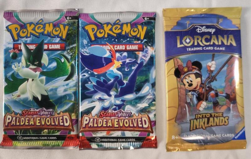 Two (2) New Pok&eacute;mon TCG Scarlet & Violet Sealed Trading Card Packs & Disney Lorcana TCG Into the Inklands Sealed Trading Card Pack