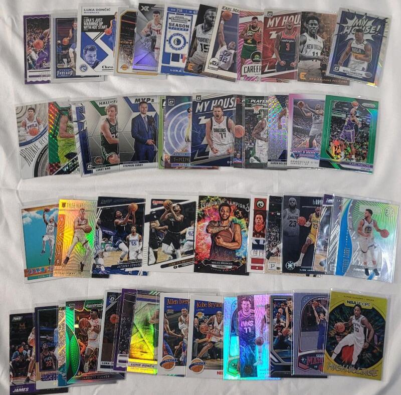 Fifty (50) NBA Basketball Trading Card Singles , 50 Trading Cards .