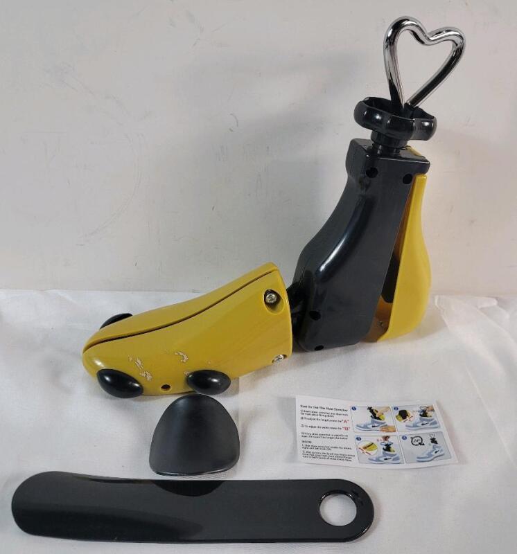 One (1) Shoe Stretcher .