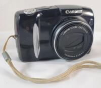 Canon PowerShot SX120 IS Digital Camera . Tested Powers Up , Requires 2 AA Batteries (not included)