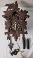 Vintage German Black Forest Wooden Cuckoo Clock . Tested , Does not Chime - will need service . Measures 9"&times;16"&times;6"