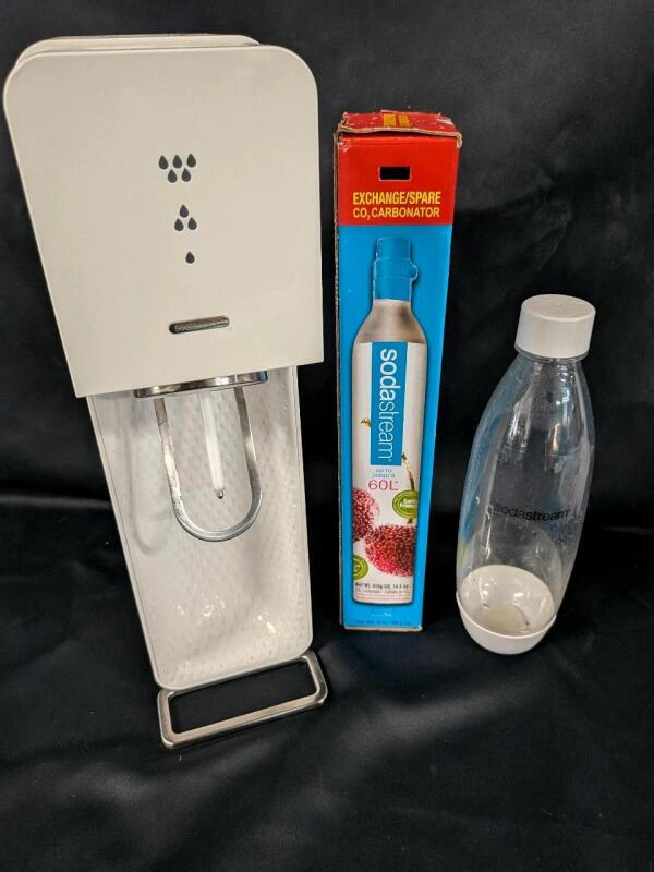Soda Stream with Replacement Carbonator and bottle. Carbonator may have been used.