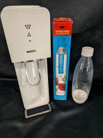 Soda Stream with Replacement Carbonator and bottle. Carbonator may have been used.